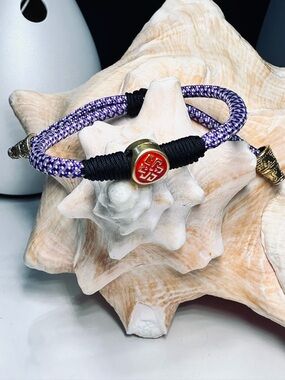 Purple Braided Cord Bracelet with Red Enamel Medallion